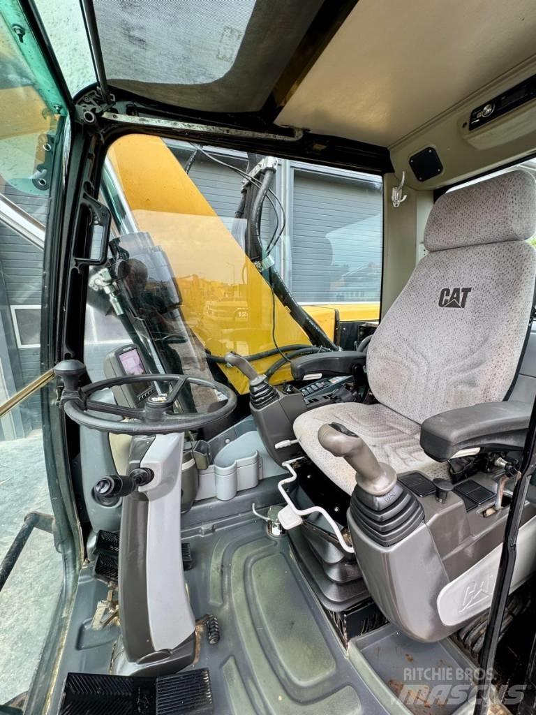 CAT M322D Gravemaskiner på hjul