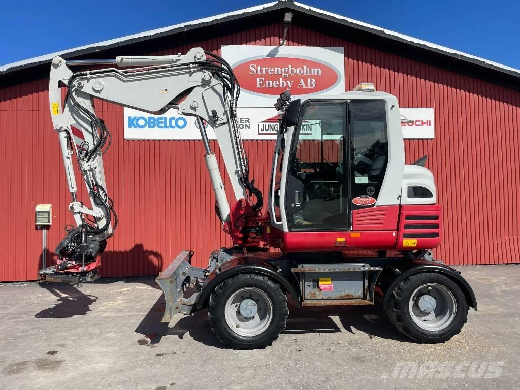 Takeuchi TB 295 W Gravemaskiner på hjul