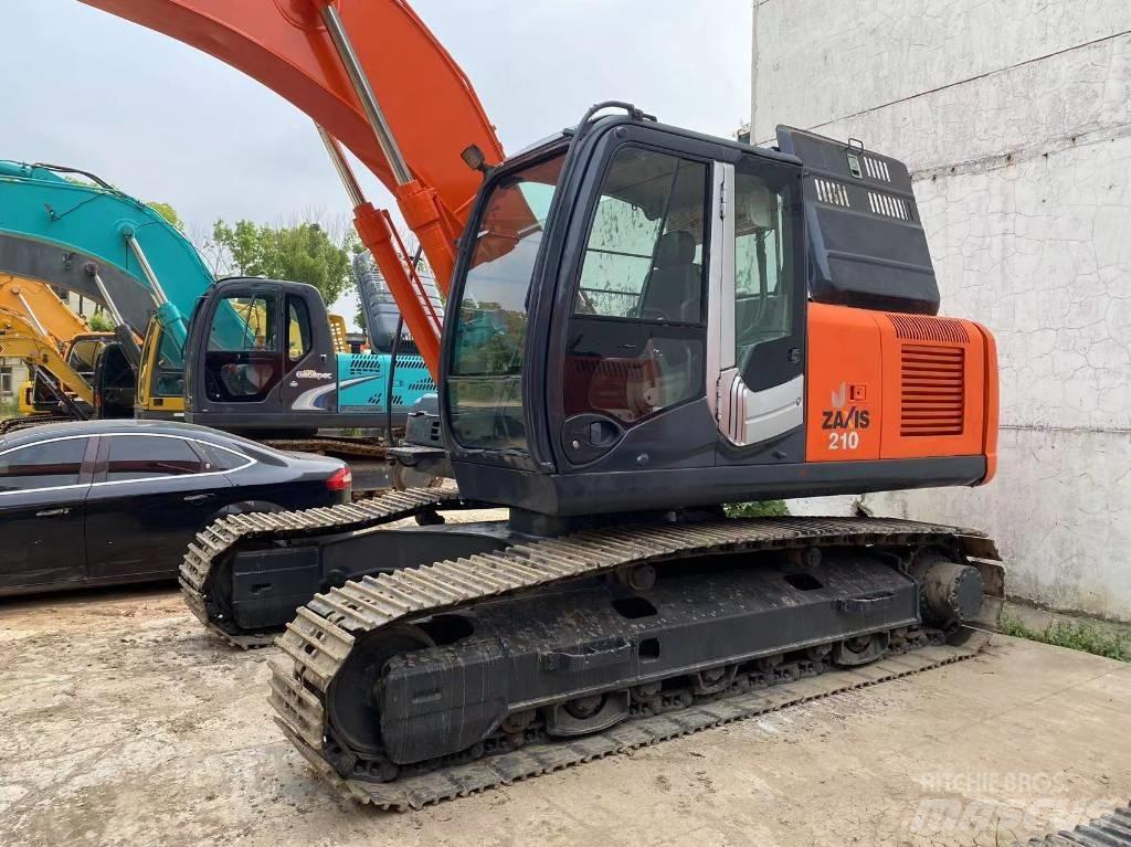 Hitachi ZX 210 Gravemaskiner på larvebånd