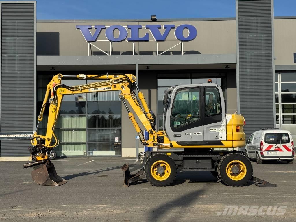 New Holland MH 2.6 Gravemaskiner på hjul