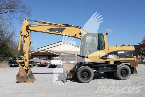 CAT M318C Gravemaskiner på hjul