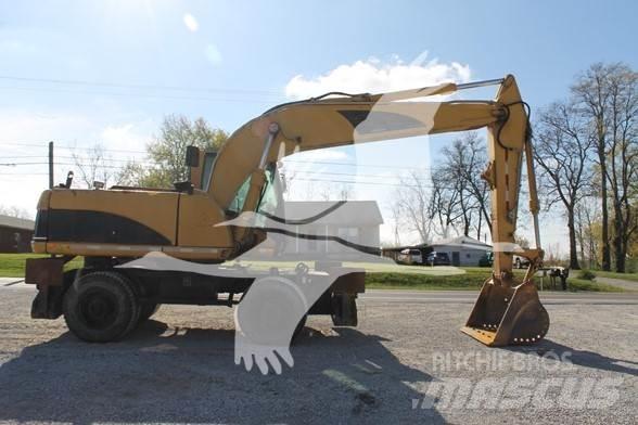 CAT M318C Gravemaskiner på hjul