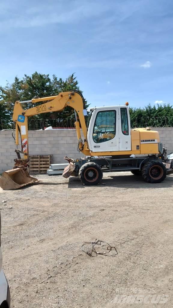 Liebherr A 311 Gravemaskiner på hjul