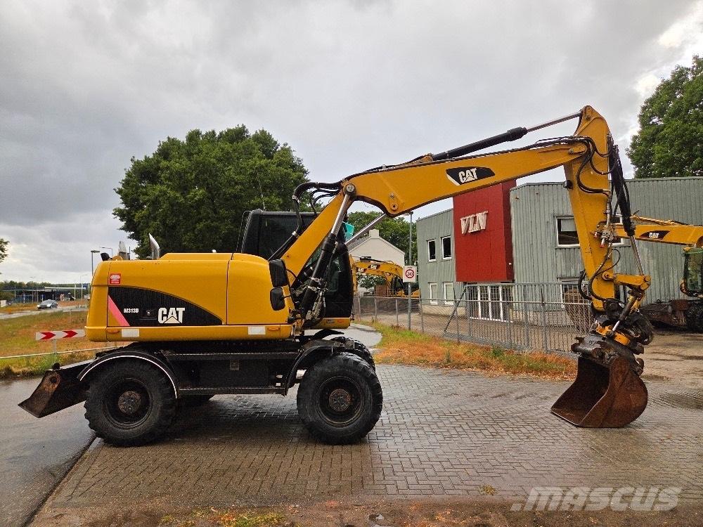 CAT M313D Gravemaskiner på hjul