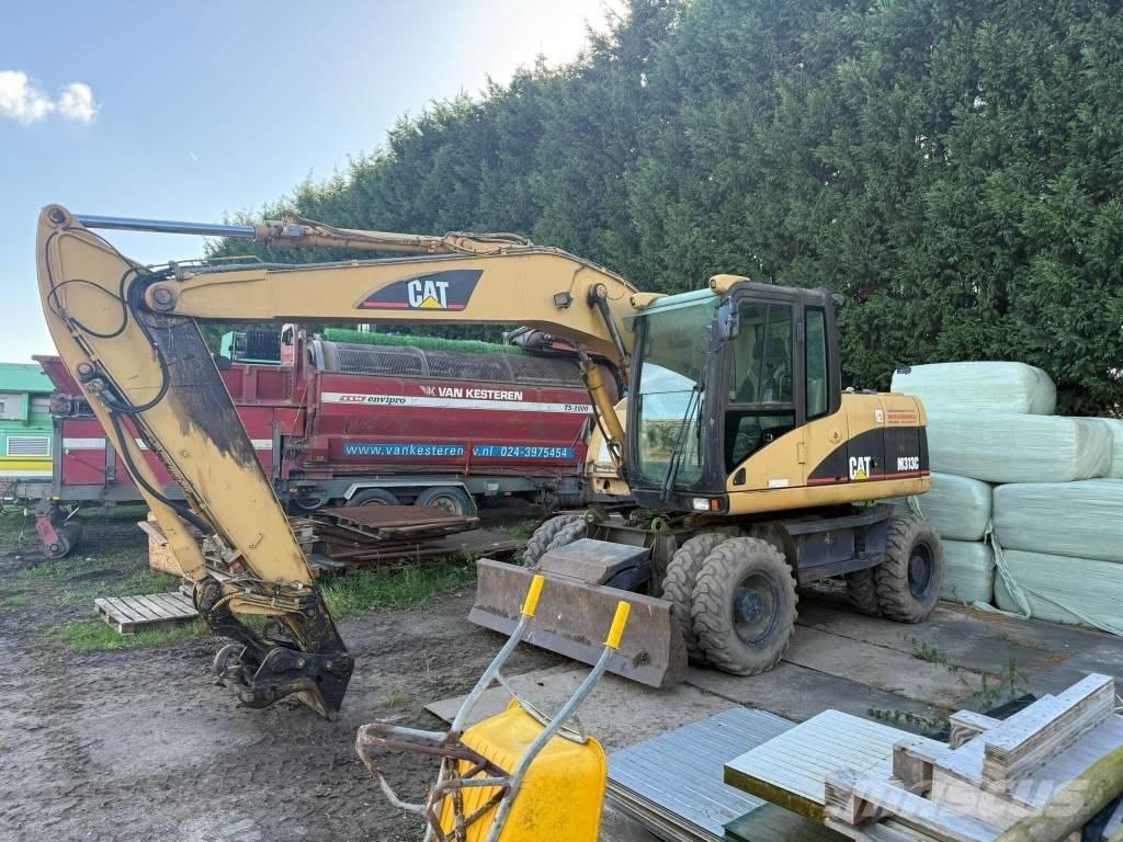CAT M 313 C Gravemaskiner på hjul