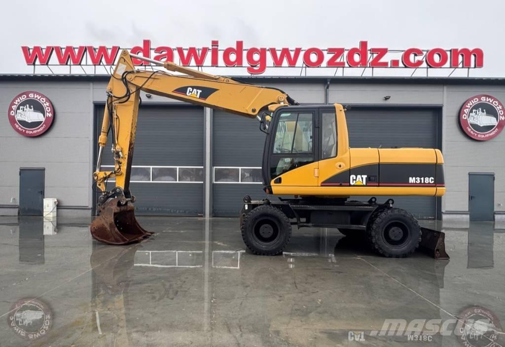 CAT M 318 C Gravemaskiner på hjul