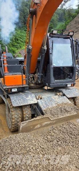 Doosan D 140W-5 Gravemaskiner på hjul
