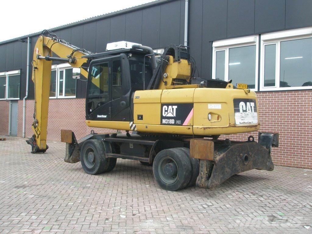CAT M318D Gravemaskiner på hjul