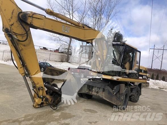 CAT M318 Gravemaskiner på hjul