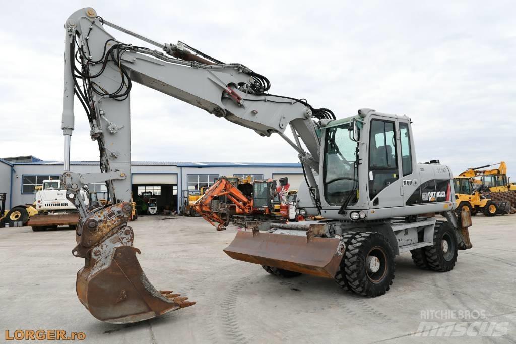CAT M 313 D Gravemaskiner på hjul