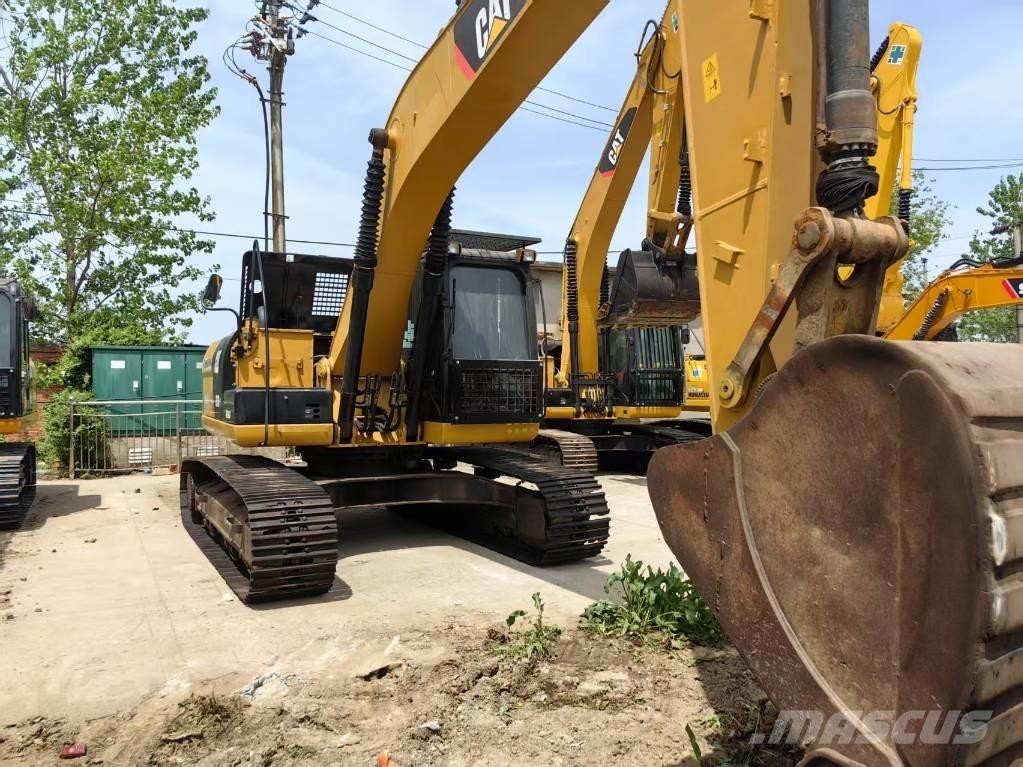 CAT 323 D Gravemaskiner på larvebånd