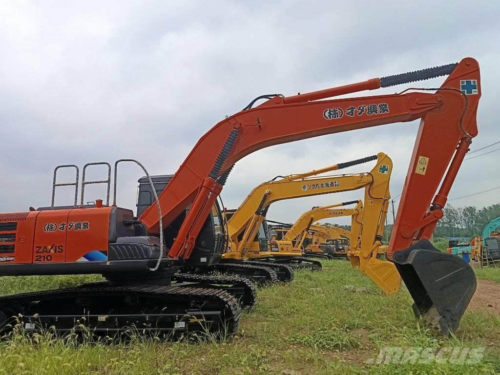 Hitachi ZX 210 Gravemaskiner på larvebånd