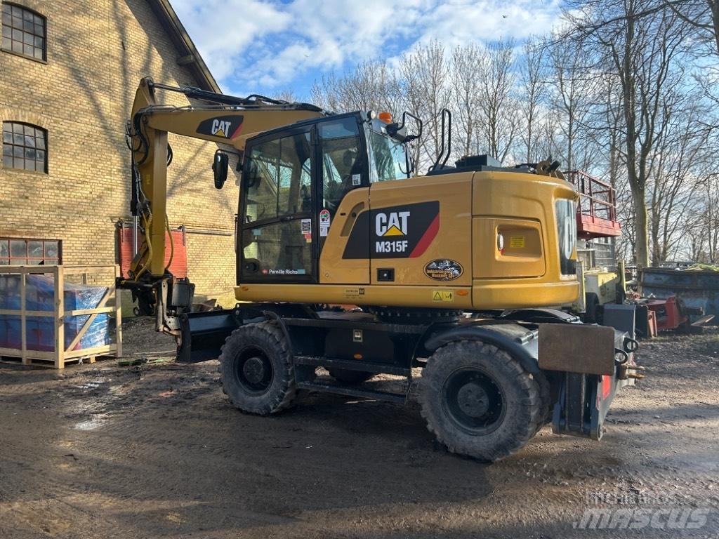 CAT M315 Gravemaskiner på hjul