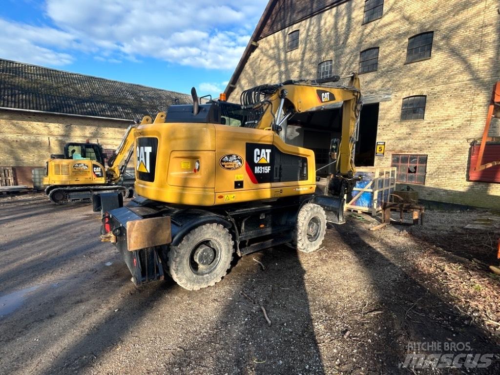 CAT M315 Gravemaskiner på hjul