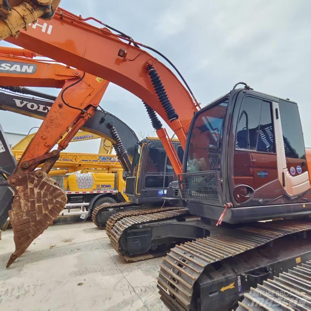 Hitachi ZX 210 Gravemaskiner på larvebånd