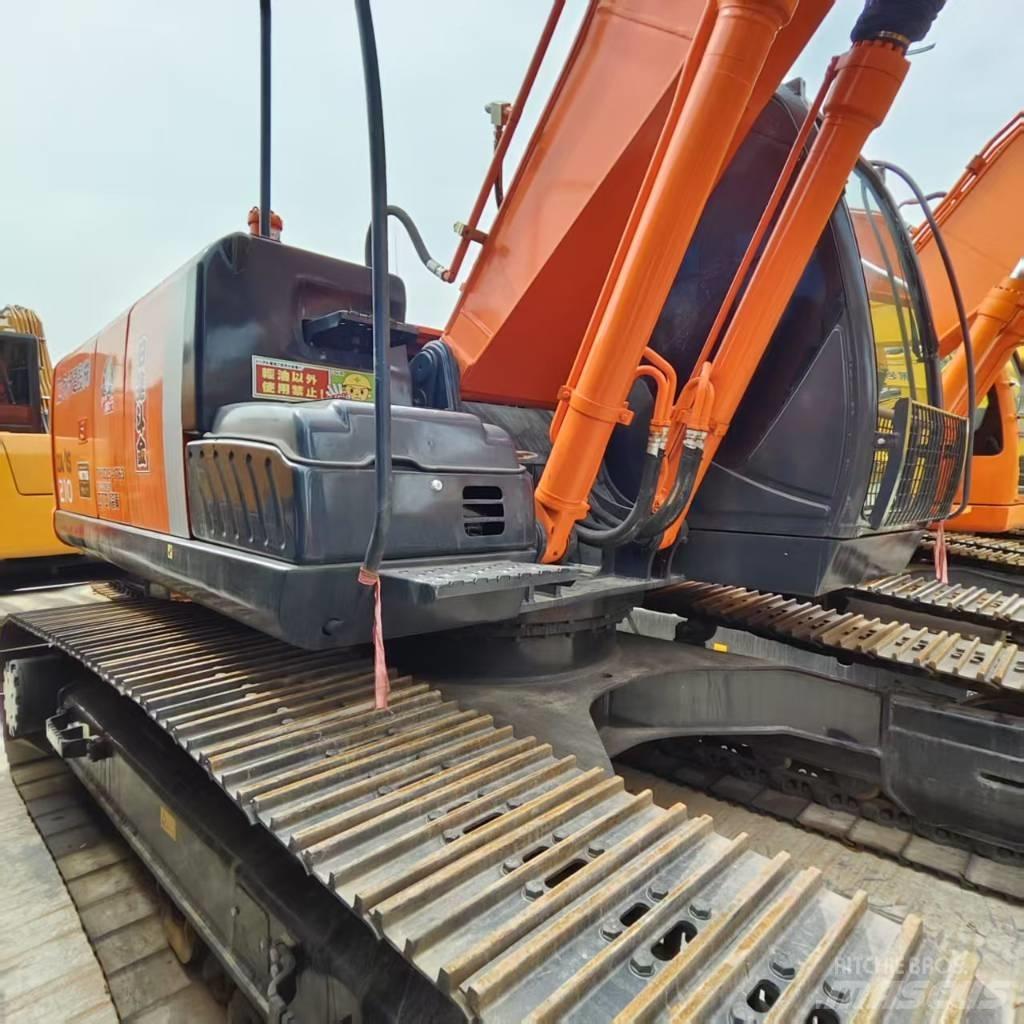 Hitachi ZX 210 Gravemaskiner på larvebånd