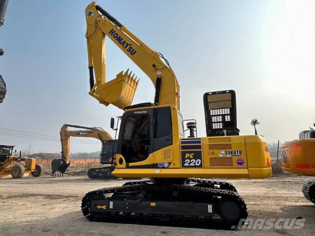 Komatsu 220 Gravemaskiner på larvebånd