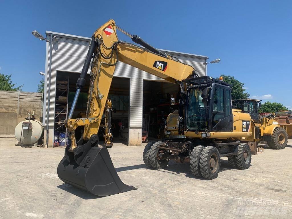 CAT M 318 D Gravemaskiner på hjul