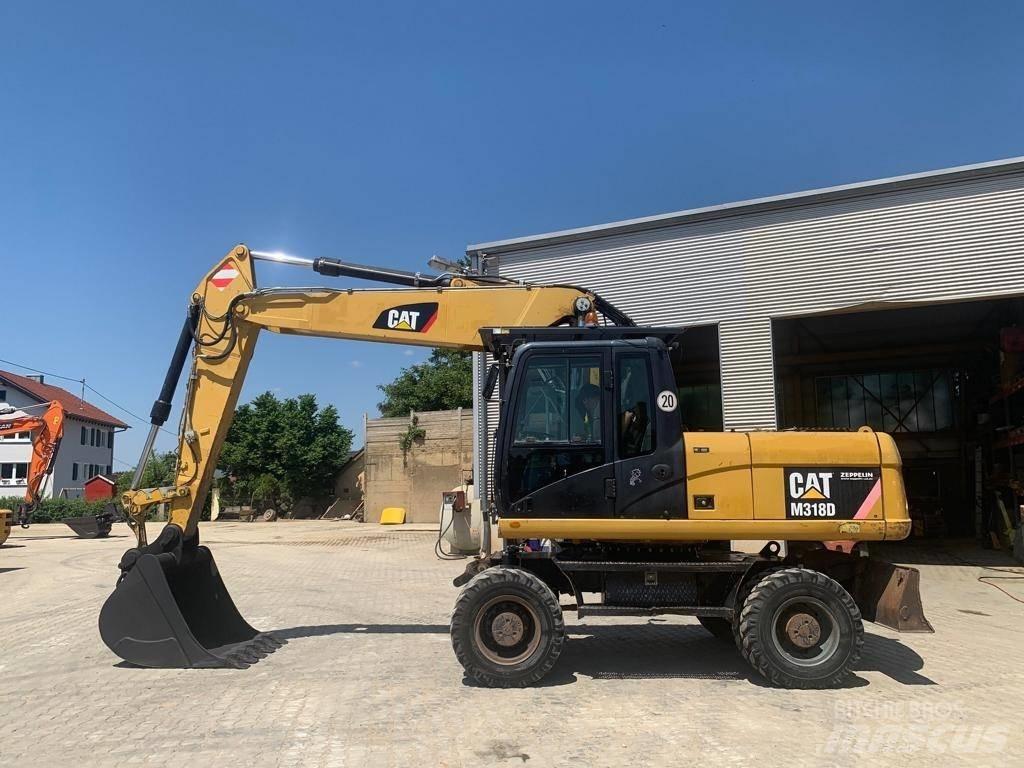 CAT M 318 D Gravemaskiner på hjul
