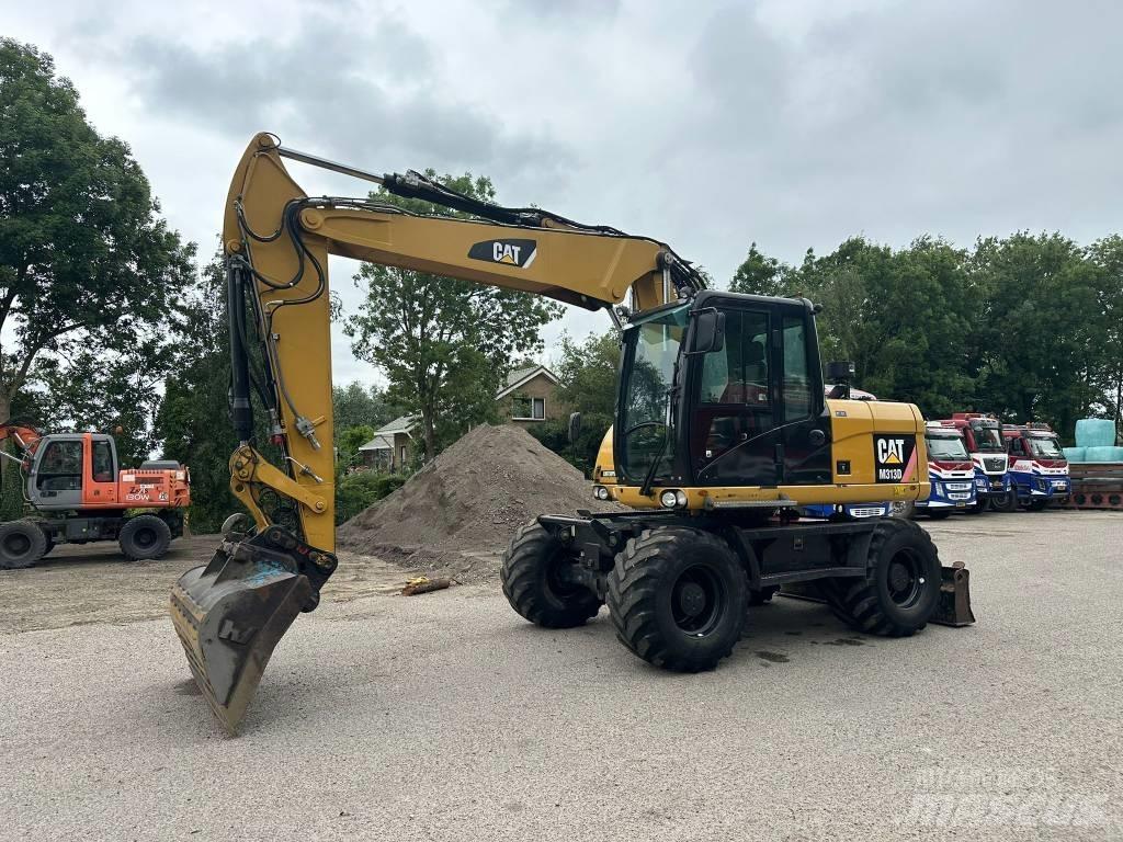 CAT M 313 D Gravemaskiner på hjul