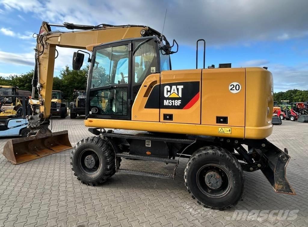 CAT M 318 F Gravemaskiner på hjul
