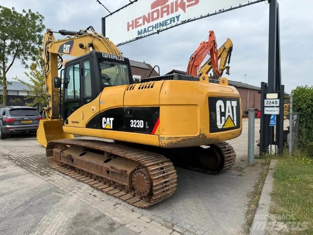 CAT 323DL (320DL) Gravemaskiner på larvebånd