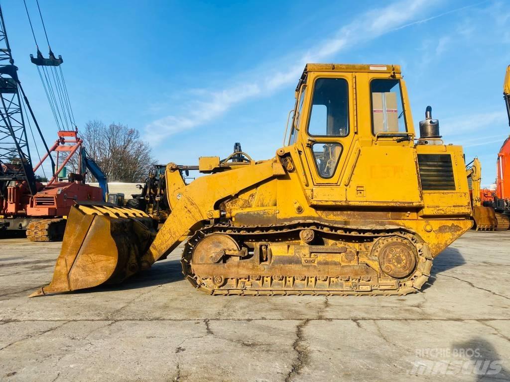 CAT 943 LGP Larvebåndslæssere