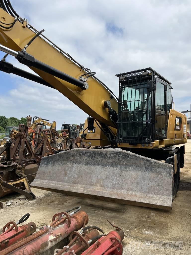 CAT MH 3022 Gravemaskiner på hjul