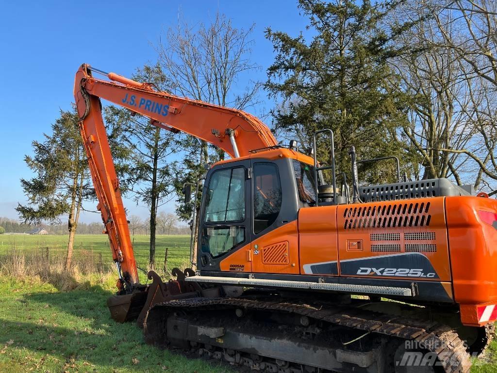 Doosan Dx225-5 Gravemaskiner med lang gravebom