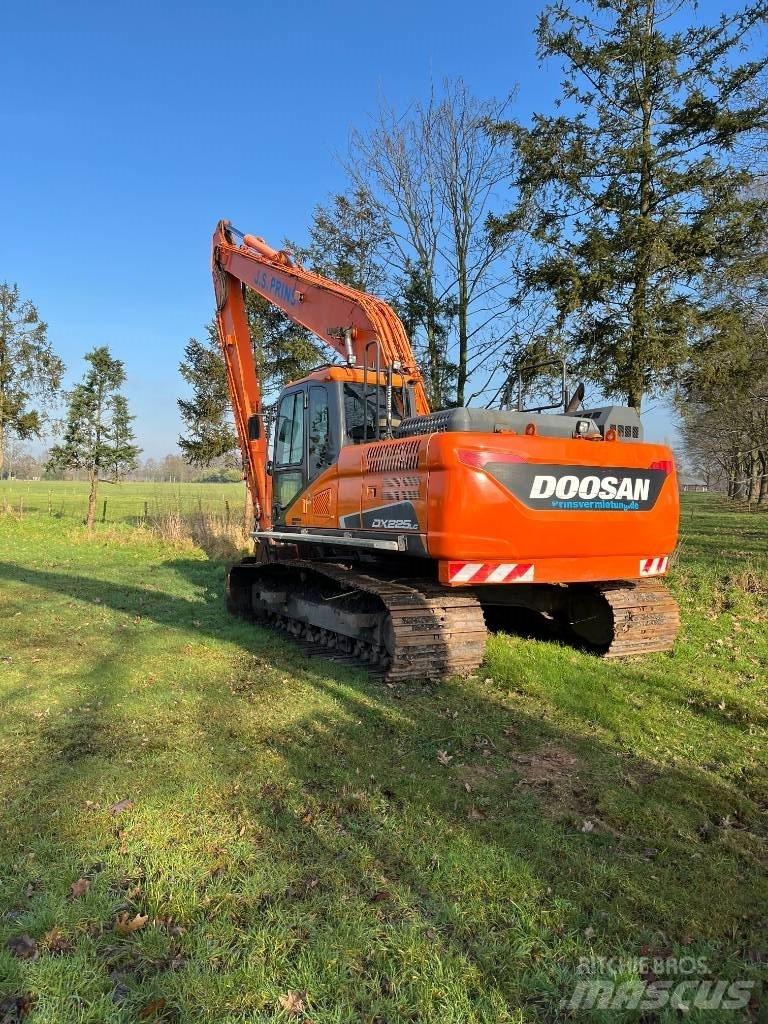 Doosan Dx225-5 Gravemaskiner med lang gravebom