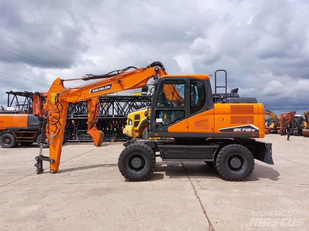 Develon DX 140 W-7 Gravemaskiner på hjul