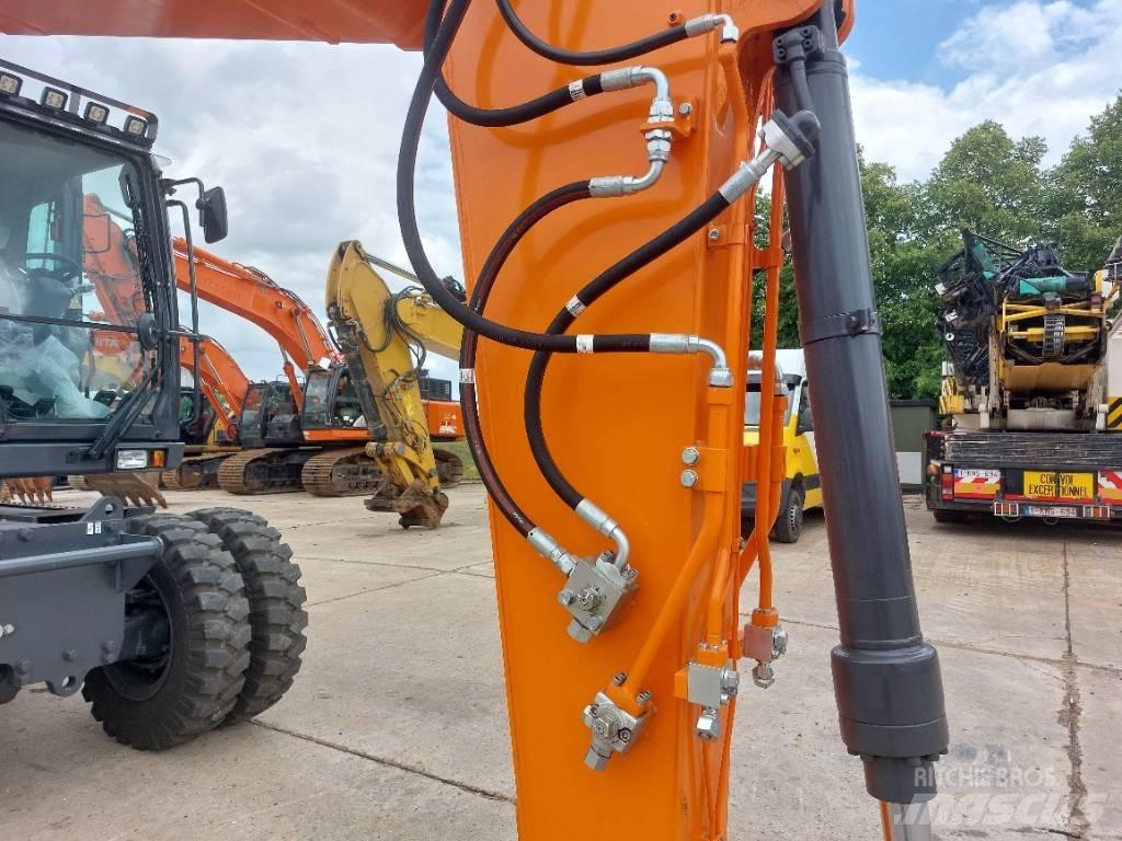 Develon DX 140 W-7 Gravemaskiner på hjul