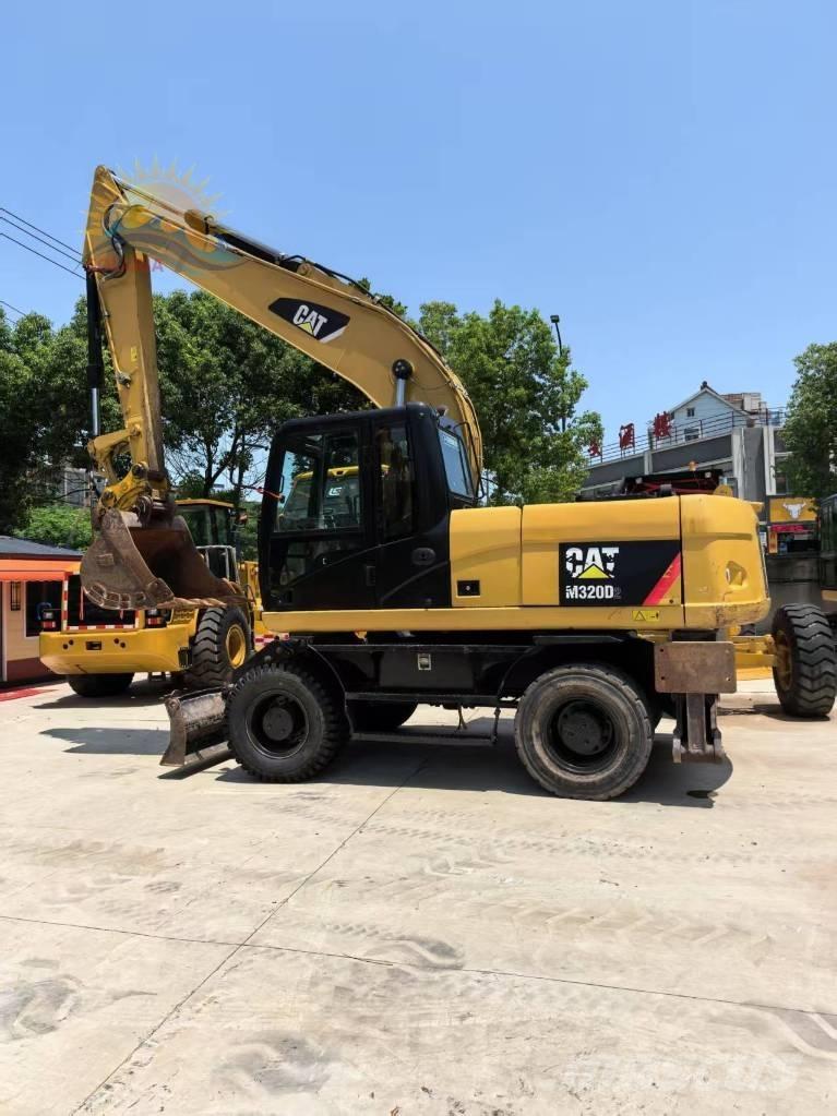 CAT M 320D2 Gravemaskiner på hjul