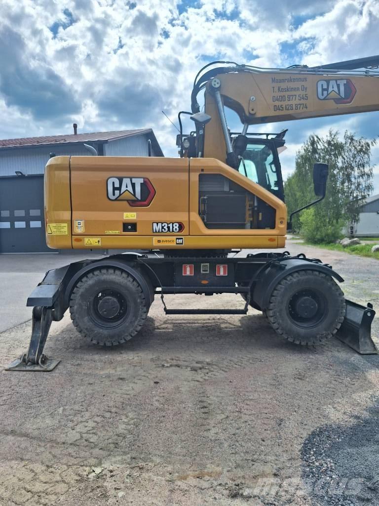 CAT M 318 Gravemaskiner på hjul