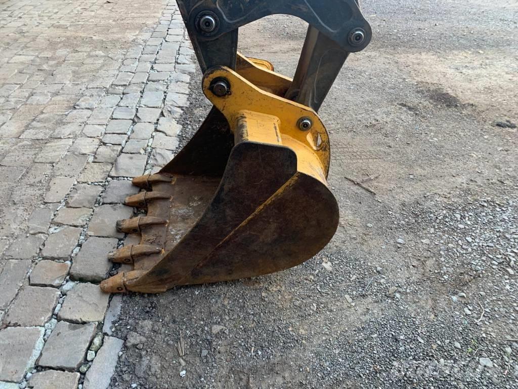 John Deere 310 L Rendegravere