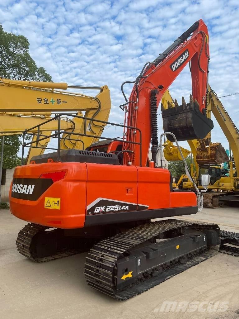 Doosan DX 225 Midi-gravemaskiner 7t - 12t
