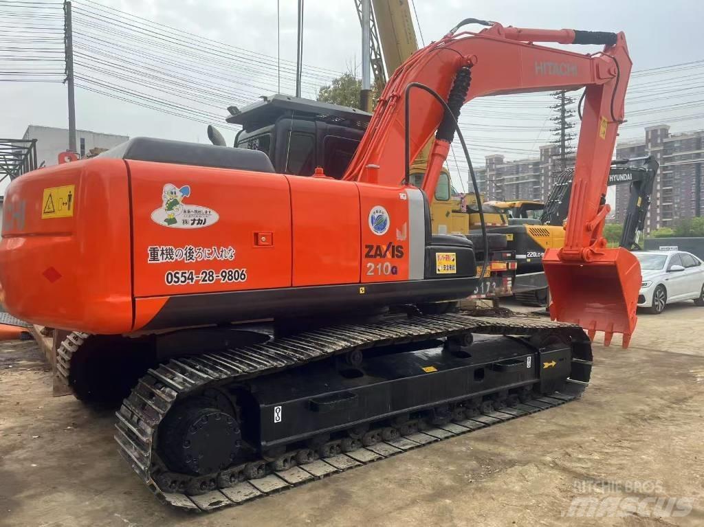 Hitachi 210LC Gravemaskiner på larvebånd