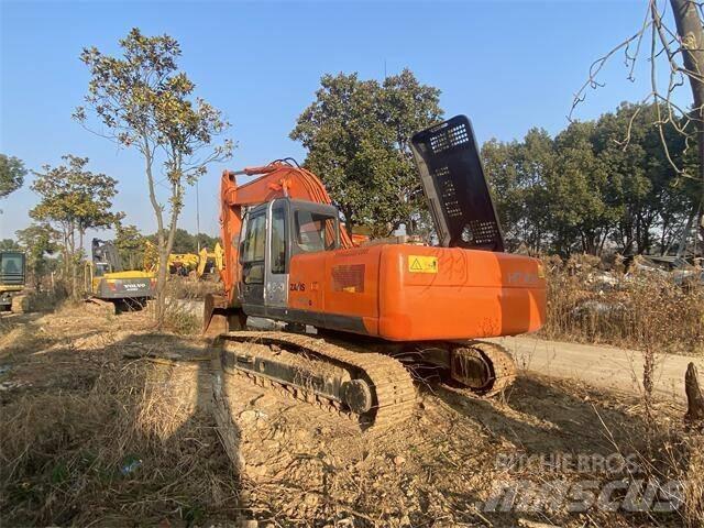 Hitachi ZX 240 Gravemaskiner på larvebånd