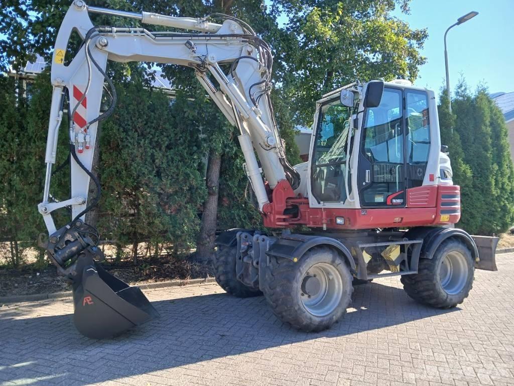 Takeuchi TB 295 W Gravemaskiner på hjul