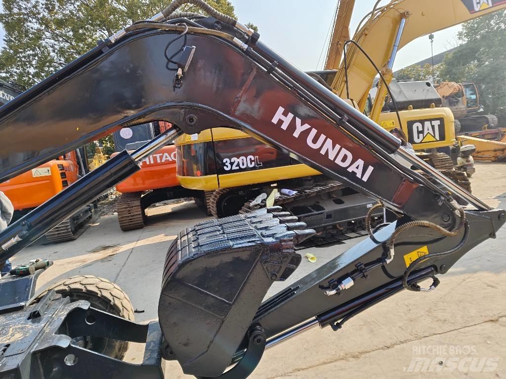 Hyundai 60W-9 Gravemaskiner på hjul
