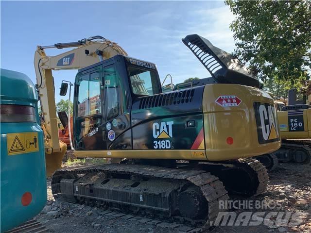 CAT 318DL Gravemaskiner på larvebånd