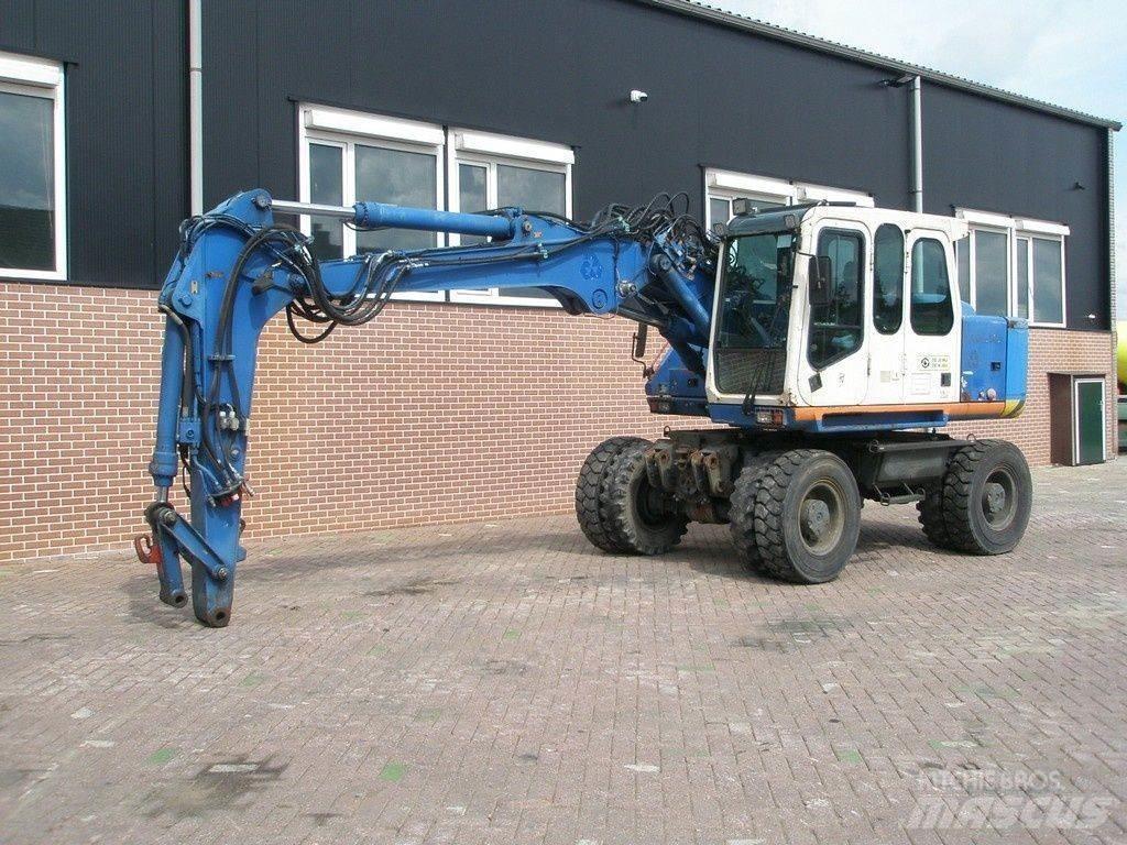 Atlas 1404 Gravemaskiner på hjul