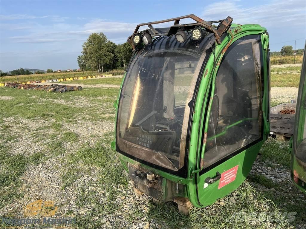 John Deere 1010E Kabiner og interiør