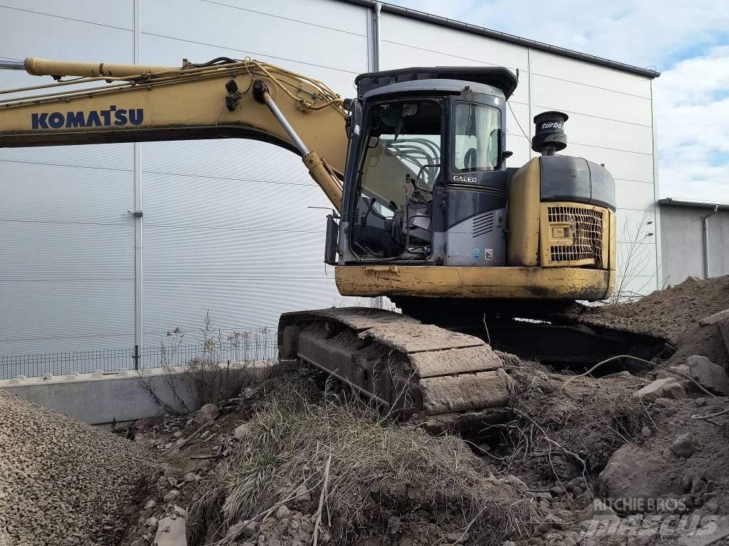 Komatsu 228 Gravemaskiner på larvebånd