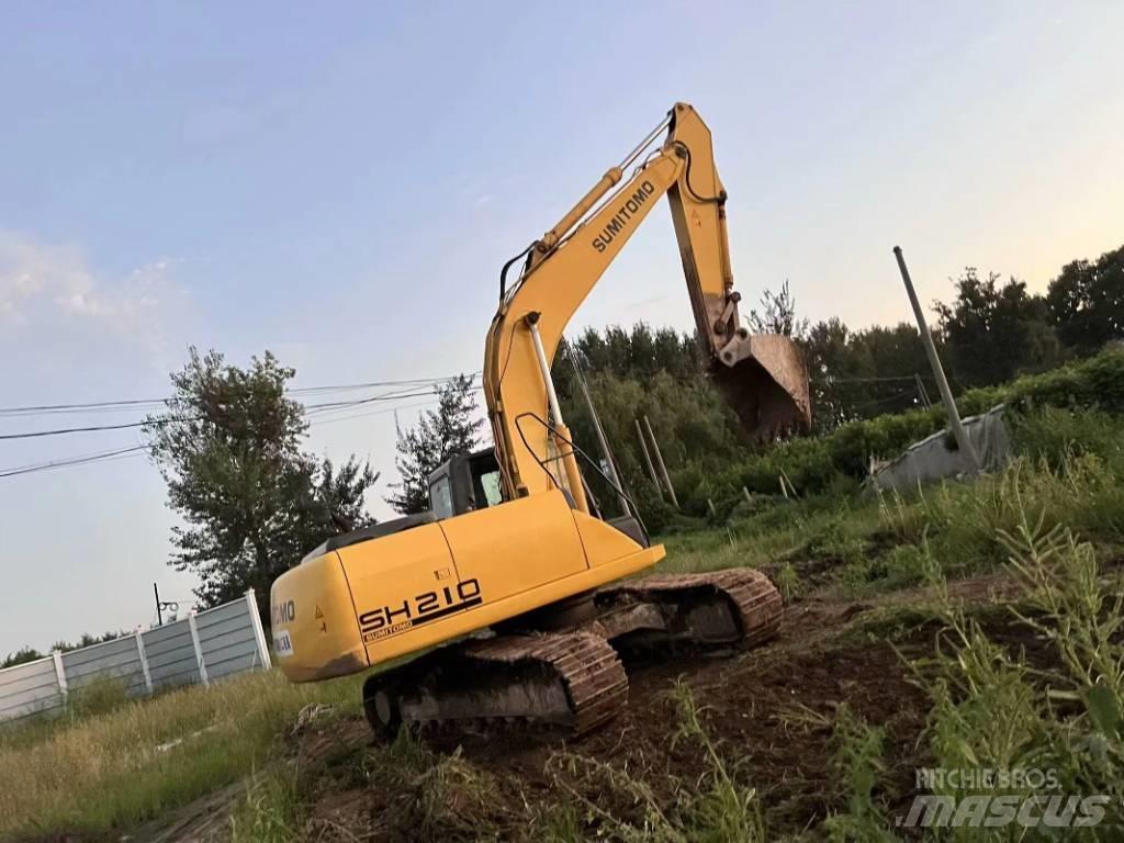 Sumitomo SH210 Gravemaskiner på larvebånd