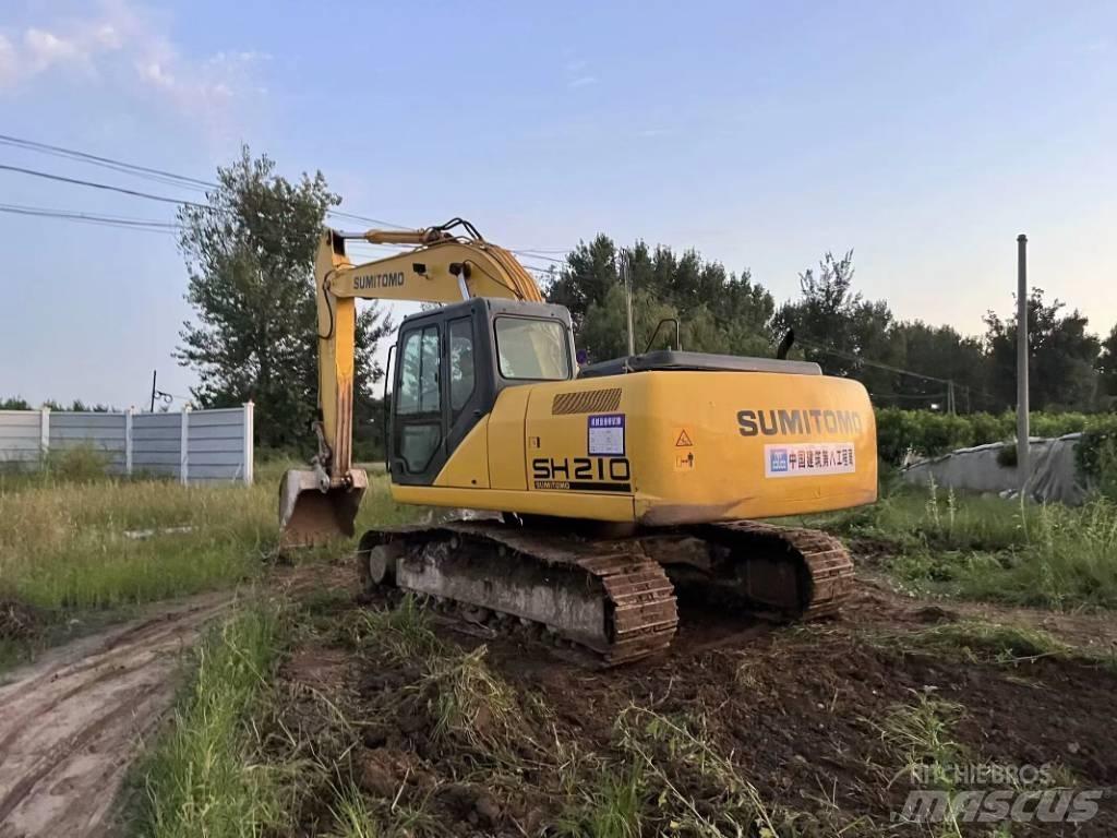 Sumitomo SH210 Gravemaskiner på larvebånd