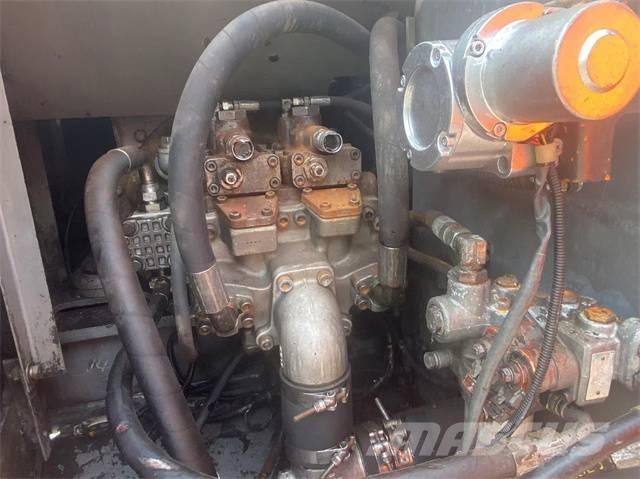 Hitachi EX120 Gravemaskiner på larvebånd