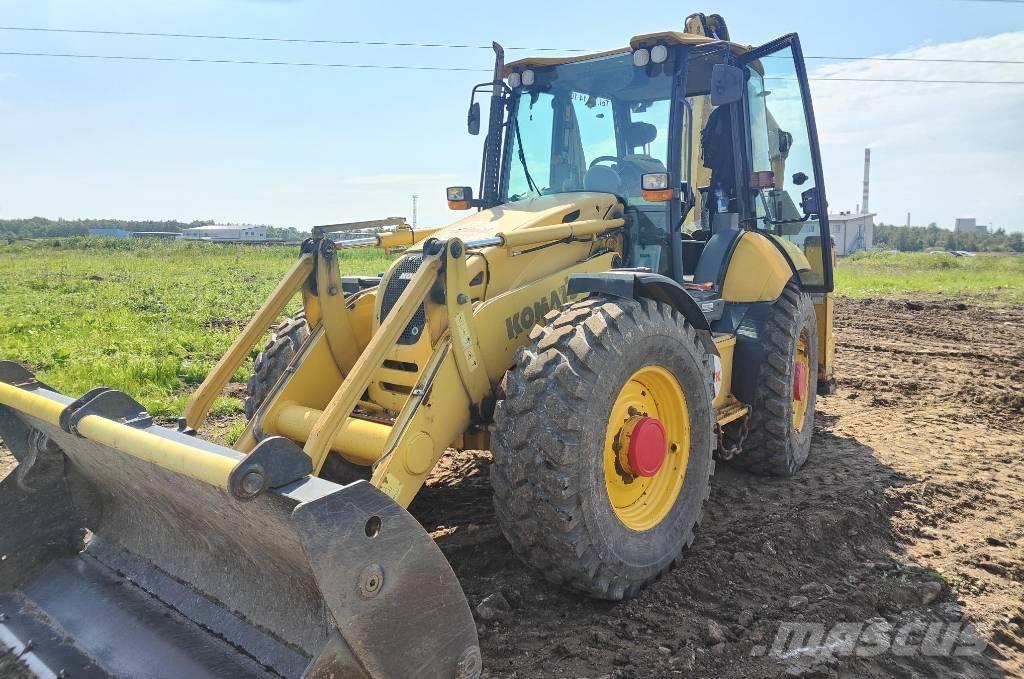 Komatsu WB97S-5E0 Rendegravere