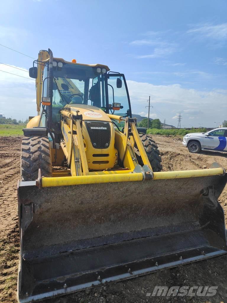Komatsu WB97S-5E0 Rendegravere