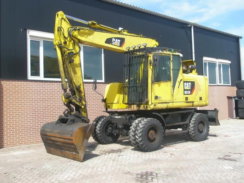 CAT M318F Gravemaskiner på hjul